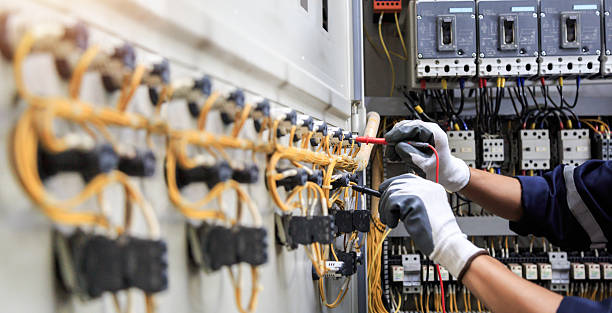 Professional Electrician technician working in Virginia Gardens, FL